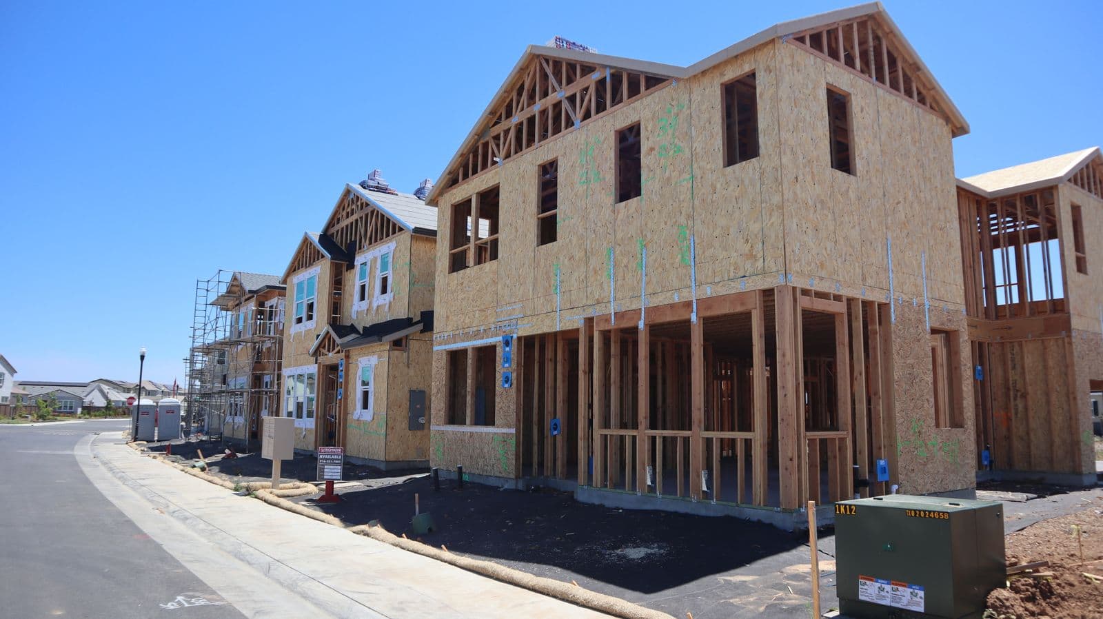 New houses in wood framing and sheathing before the siding goes on